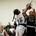 Arbor Prep Jamie Rittenhouse shoots and scores over Green Hills defender Sabrina Thompson on Monday, Feb. 11. Arbor Prep won 74-34. Daniel Brenner I AnnArbor.com